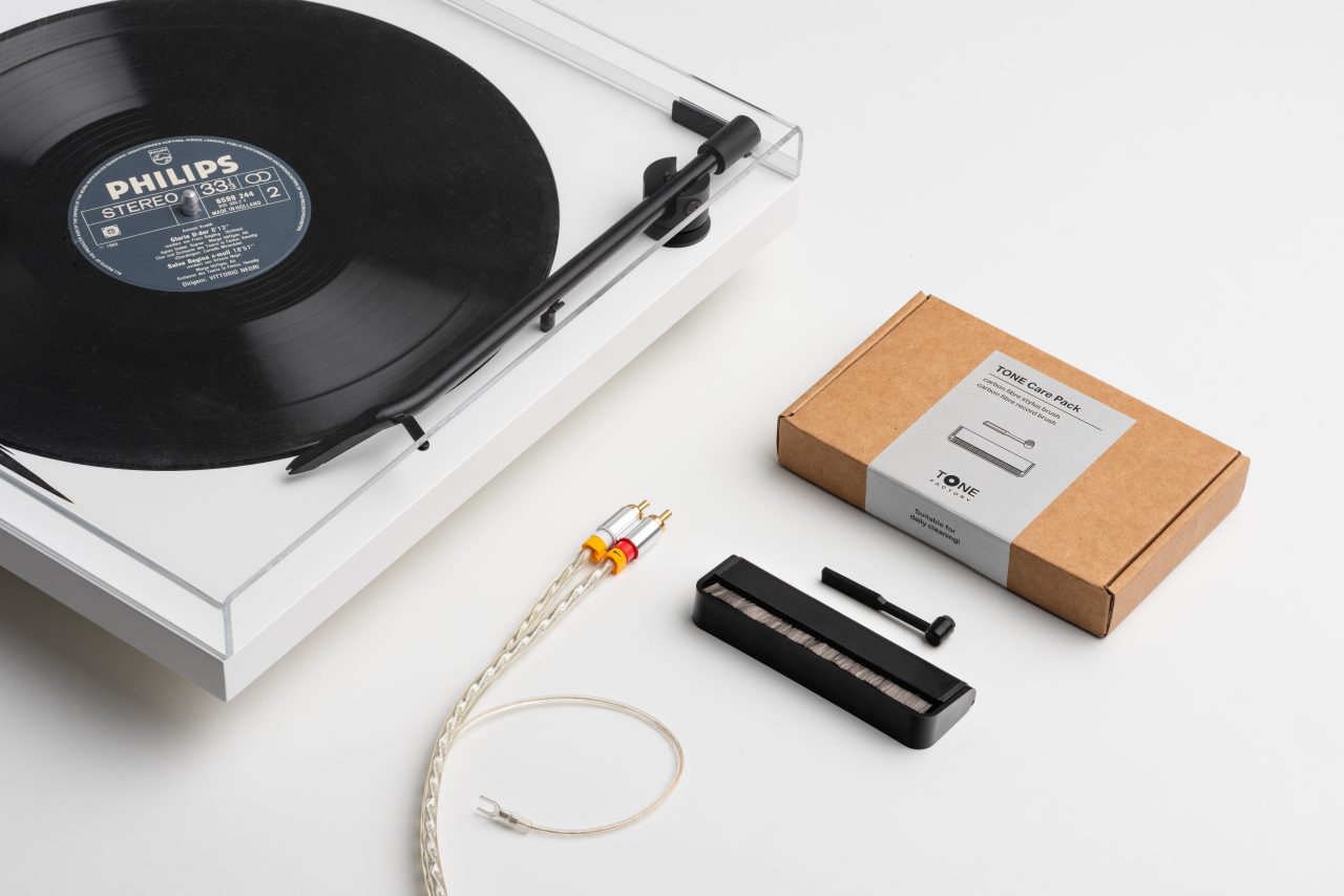 Tone turntable, white statin, on white underground and background, tone RCA cable, Tone Cleaning set,Record Brush,stylus brush, Care Pack